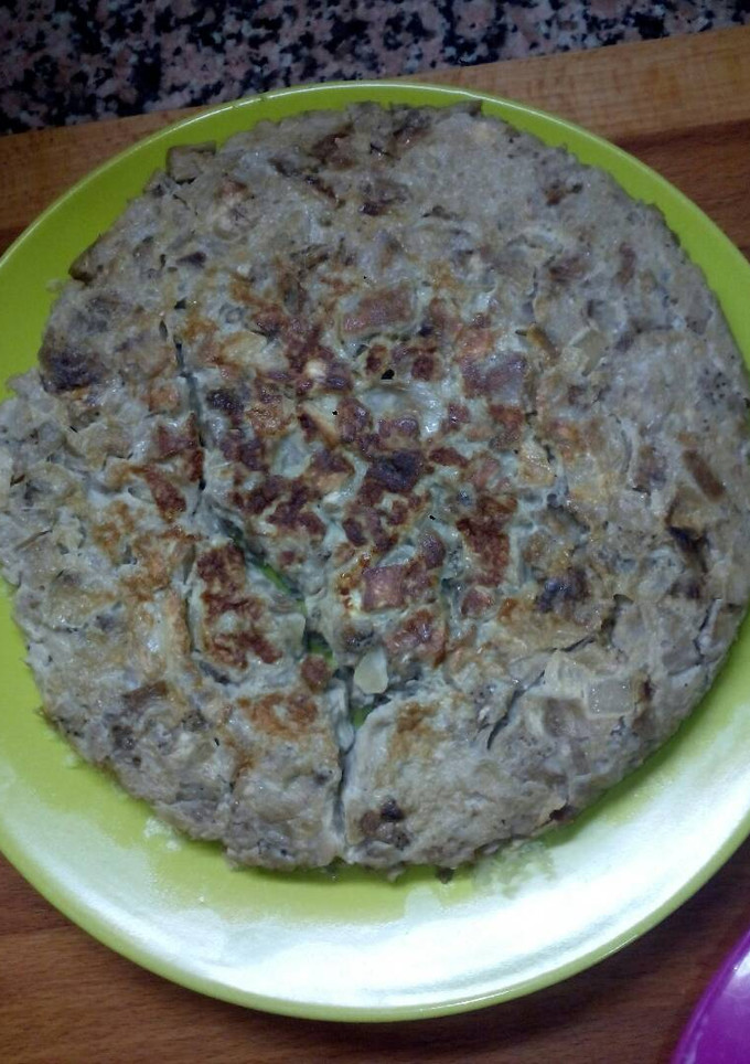 Una foto de Tortilla de berengenas y cebolla