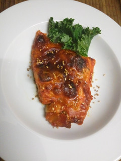Una foto de Bacalao con tomate y mozzarella