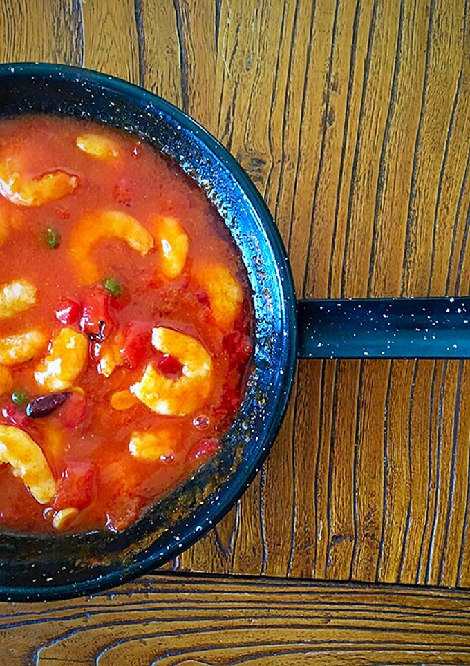 Una foto de Langostinos en salsa Rigamonti