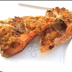 A picture of Salmon Fish Head with Spicy Lemongrass Paste.