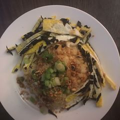 A picture of Green bean sweet rice w/ egg plus seaweed.