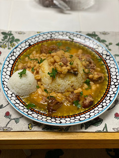 A picture of Beans and Rice w/ Smoked Turkey Wings.