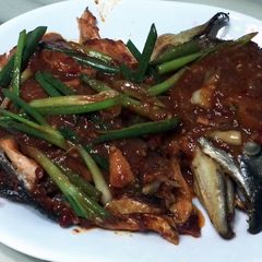 A picture of Salmon And Scallion In Chili Bean Paste Sauce.