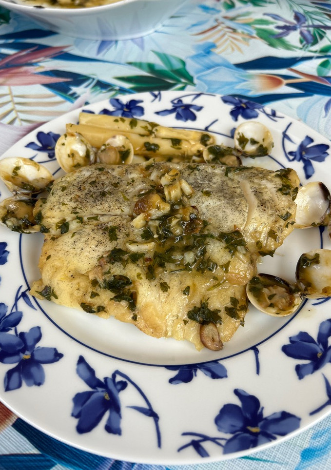 Una foto de Merluza en salsa verde