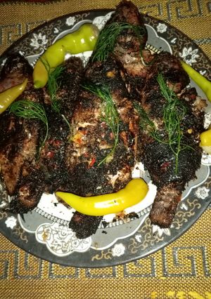 صورة لوصفة سمك مشوي ومحشي بالطماطم والخضره 😋