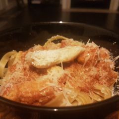 A picture of Orange Sauce Fettuccine, with Fish & Veg.