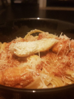 A picture of Orange Sauce Fettuccine, with Fish & Veg.