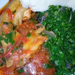 Chicken Served with Ugali and Kales A picture of Chicken Served with Ugali and Kales.