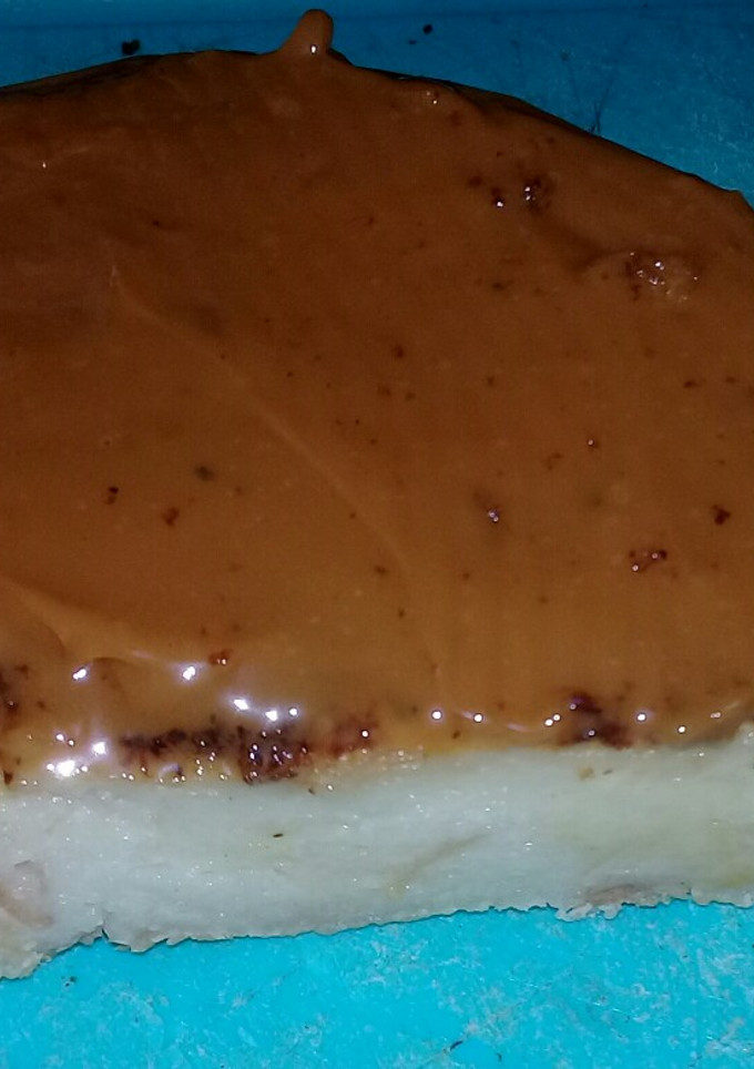 Una foto de Budín de pan sin caramelo solo con dulce de leche