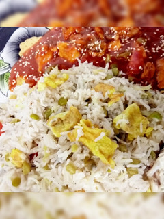 A picture of Egg fried rice with Dragon Chicken😋.