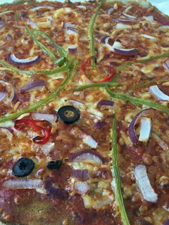Una foto de Pizza vegana con harina de teff