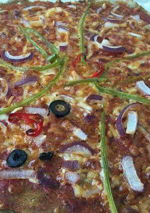 Una foto de Pizza vegana con harina de teff