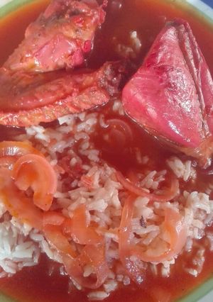 Una foto de Pollo en achiote