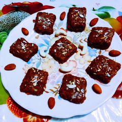 A picture of ઠાકોરજી નો ભોગ થાળ વસાણા યુક્ત સૌભાગ્ય સૂંઠ પાક.
