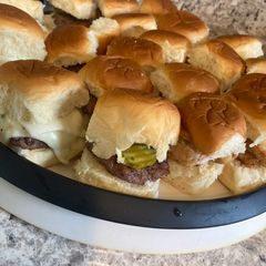 A picture of Chicken sandwich and hamburger sliders.