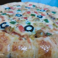 Corners Cheese filled pizza A picture of Corners Cheese filled pizza.