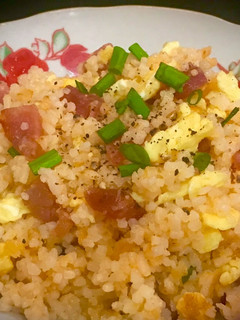 A picture of Fried Rice with Eggs and Chinese Sausage.