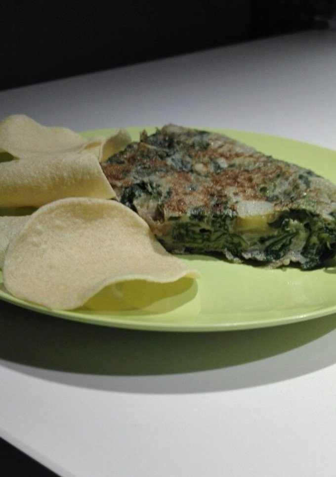 Una foto de Tortilla de berenjena y espinacas 🍆🌿