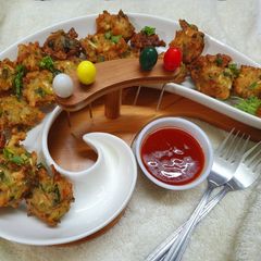 A picture of Cabbage Lachha Pakoda or Crispy Cabbage Fritters.