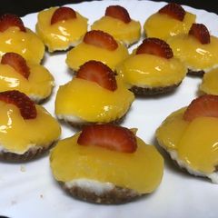 A picture of Orange custard mini tarts.