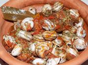 Una foto de caracoles a la cazuela
