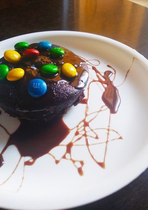 A picture of Eggless chocolate cup cakes leftover metled icecream.