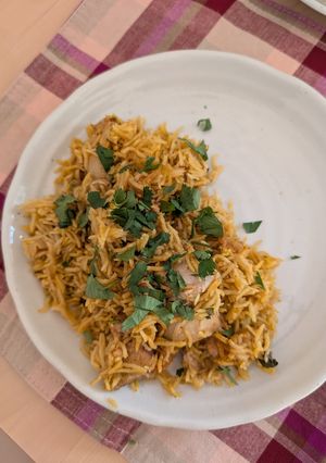 A picture of Chicken biriyani in pressure cooker.