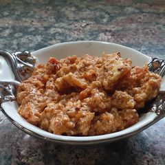 A picture of Paneer bhurji with sauce.