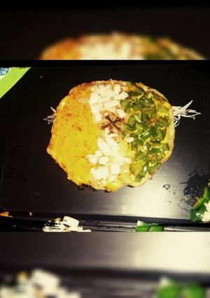A picture of Veggie loaded uttpam pizza.