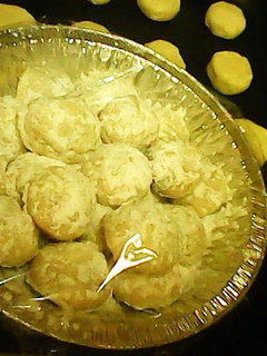 A picture of Snowball Cookies with Chocolate mint centers.