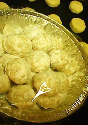 A picture of Snowball Cookies with Chocolate mint centers.