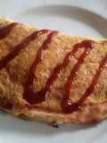 Omelette de J&Q relleno de repollo y zanahoria con aceitunas