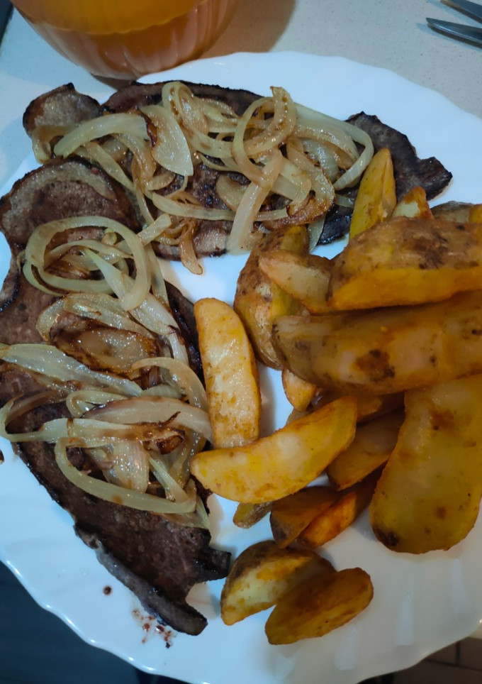 Una foto de Hígado encebollado