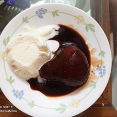 Poached Pears in Red wine with Ice cream A picture of Poached Pears in Red wine with Ice cream.
