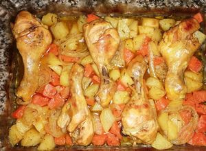 Foto principal de Muslos de pollo con patatas y boniato al horno