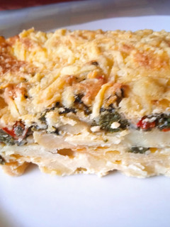 Una foto de Pastel de papas, acelga y queso