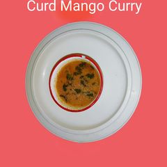 A picture of Curd Mango Curry.