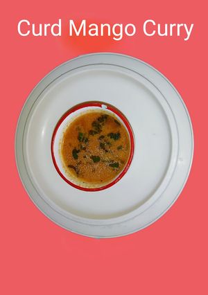 A picture of Curd Mango Curry.