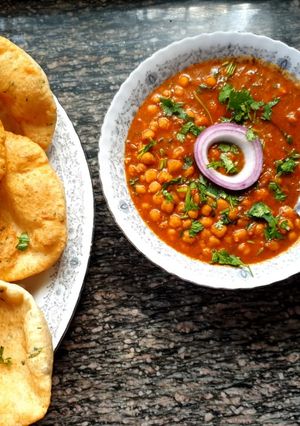 A picture of White chickpeas curry n Bhatura #4week challenge# Charity recipe.