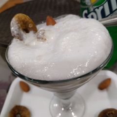 A picture of Icecream and sprite punch.