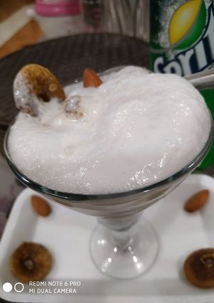 A picture of Icecream and sprite punch.