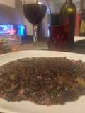 Riso venere con acciughe olive e zucchine al sapore di zafferano