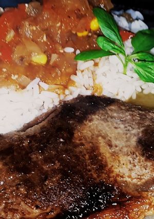 Una foto de Arroz Con Churrasco
