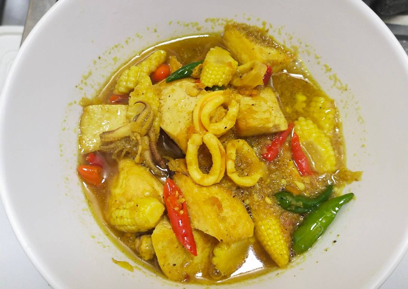 Tahu cumi pesmol kuah kuning