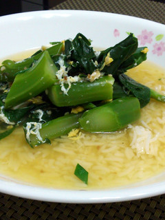 A picture of Chinese Broccoli And Egg Rice Soup.