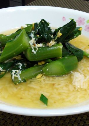A picture of Chinese Broccoli And Egg Rice Soup.
