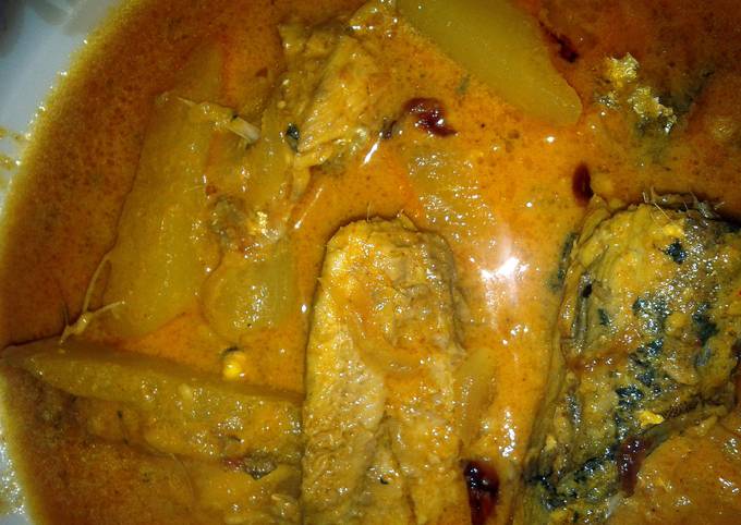 Delicious Food Mexico Food Fish and Raw Mango curry in Coconut based gravy