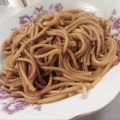 A picture of Spaghetti with rich tamato sauce.