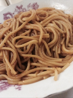 A picture of Spaghetti with rich tamato sauce.