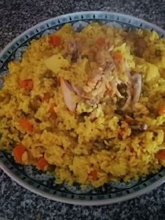 صورة لوصفة رز بالدجاج او الخضر👍